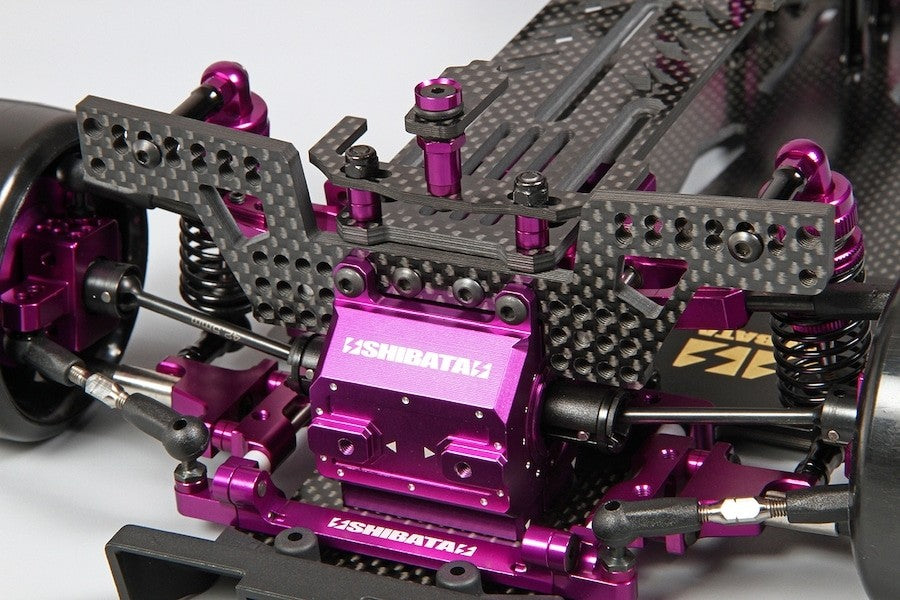 Support d'amortisseur arrière pour batterie en position basse